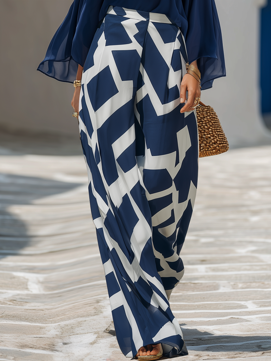 PIZZONI - Set due pezzi blu navy con maniche velate e pantaloni geometrici