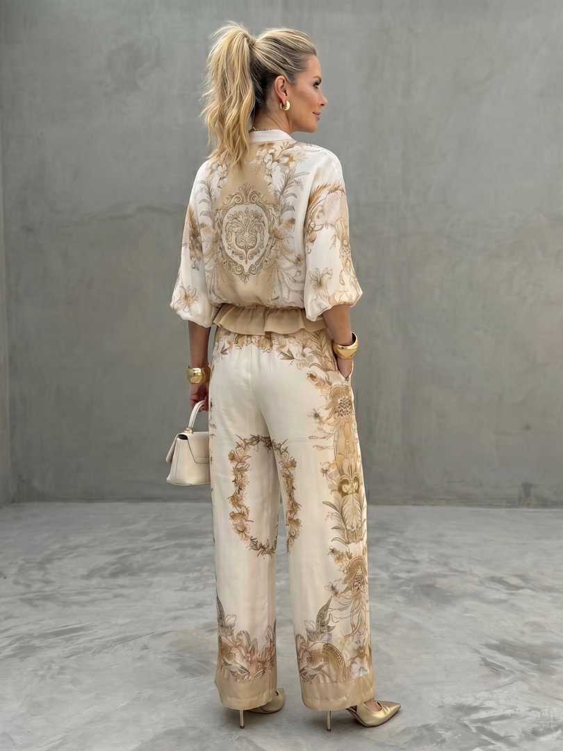 COLMURANO - Set due pezzi bianco con blusa zip e pantaloni stampati