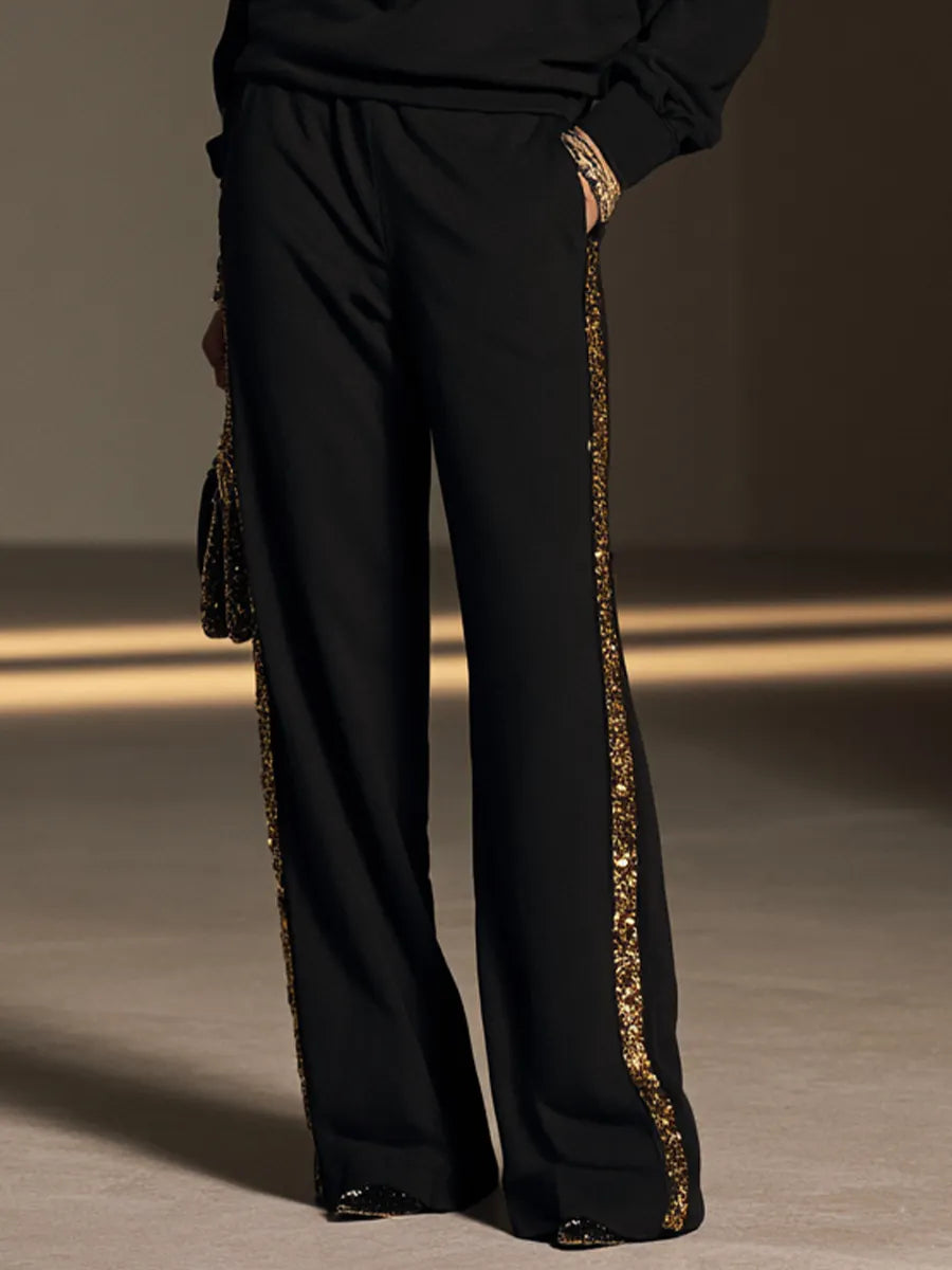 SABRINA - Set due pezzi nero con paillettes e pantaloni wide-leg