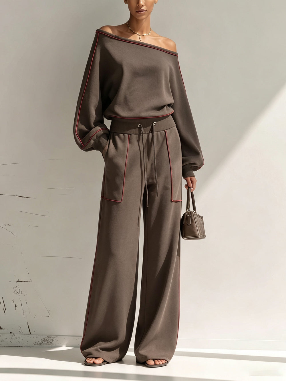 FONTE - Completo marrone asimmetrico con pantaloni wide leg