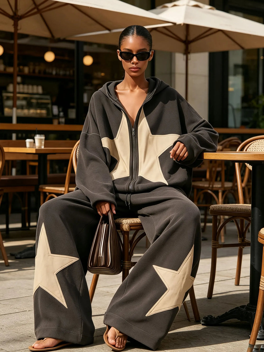 DRONERO - Set due pezzi nero con stella, felpa oversize e pantaloni wide leg