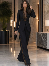 EUROPA - Tailleur nero blazer e pantaloni ampi con bordo leopardato