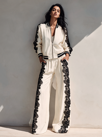 CLETO - Set bianco con top corto e pantaloni ampi in pizzo
