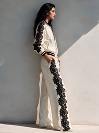 TERZO - Set due pezzi bianco con pizzo e pantaloni a gamba larga