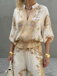 COLMURANO - Set due pezzi bianco con blusa zip e pantaloni stampati