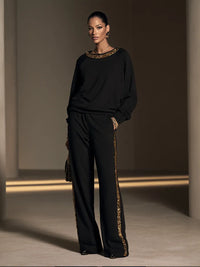 SABRINA - Set due pezzi nero con paillettes e pantaloni wide-leg