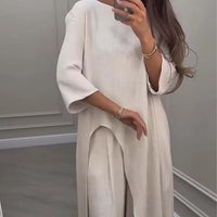 GAZZOLA - Set due pezzi top asimmetrico e pantaloni palazzo tinta unita