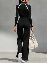 TOLLO - Completo nero con righe, collo half zip e pantaloni wide leg