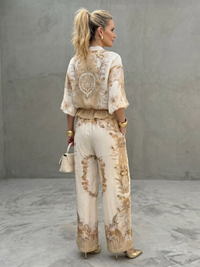 COLMURANO - Set due pezzi bianco con blusa zip e pantaloni stampati