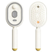 DUNA - Spazzola massaggiante spray elettrico viola, rosa o beige