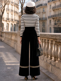 GRISELDA - Jumpsuit vintage in velluto a righe con fiocco al collo