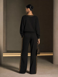 SABRINA - Set due pezzi nero con paillettes e pantaloni wide-leg