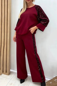 MEDEA - Set due pezzi paillettes con top ampio e pantaloni palazzo a tasche