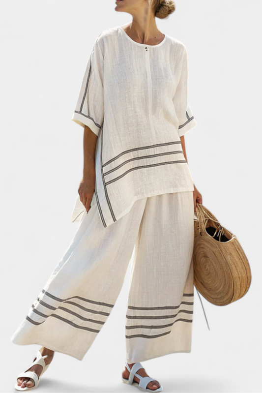 BOLOGNANO - Completo a Righe con Pantalone Ampio e Blusa Asimmetrica