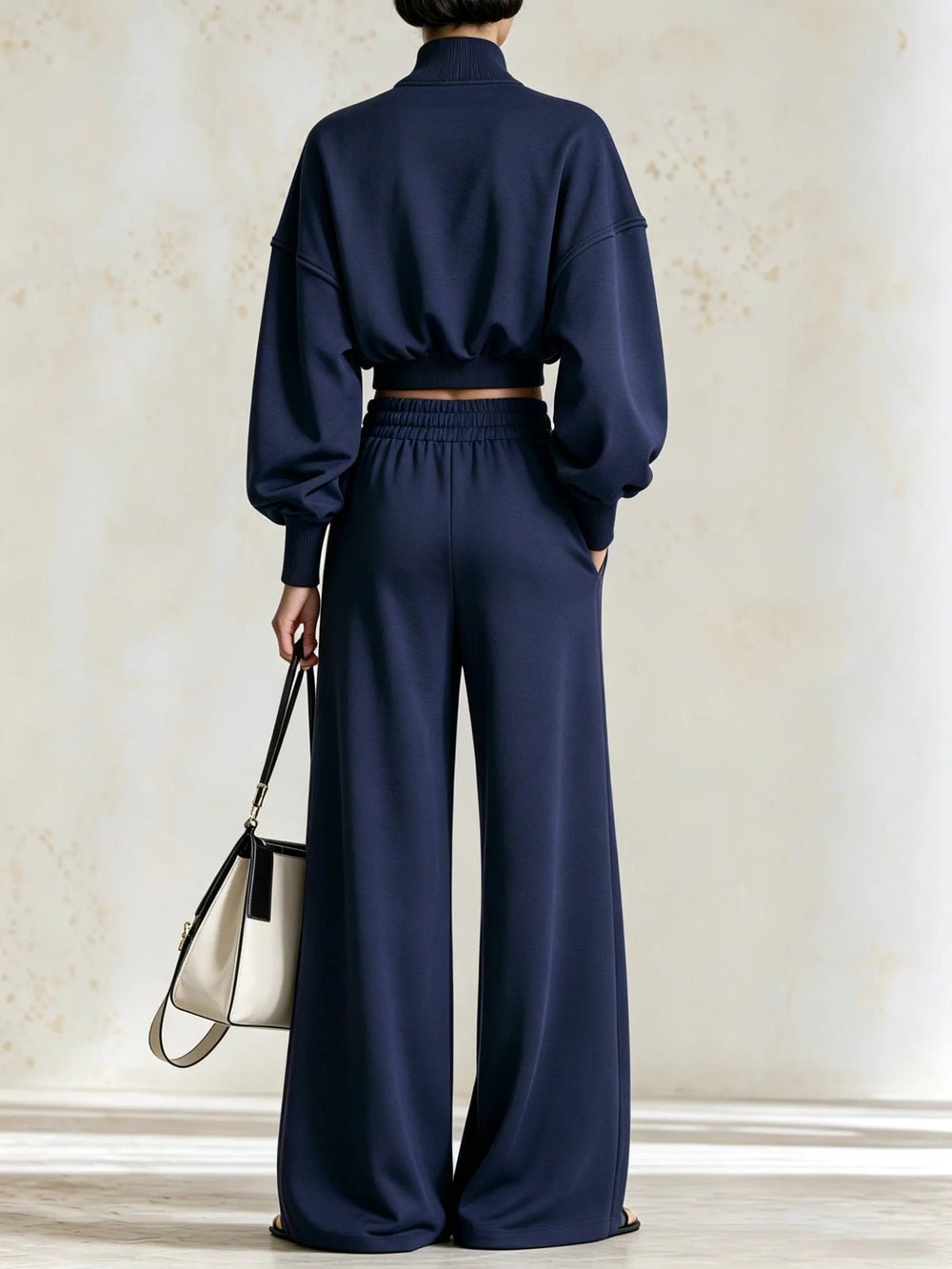 MINUCCIANO - Tuta blu con righe gialle, giacca cropped e pantaloni ampi