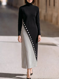 PORCARI - Maxi dress nero a collo alto con bottoni asimmetrici