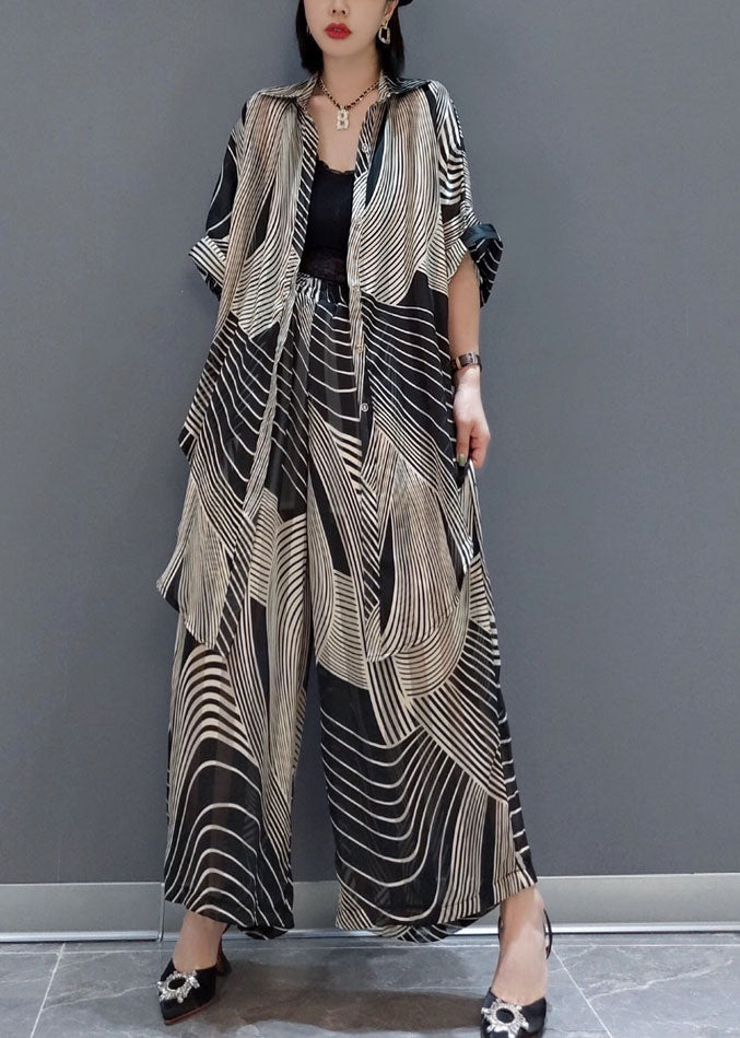 CENTRACHE - Set due pezzi nero oversize in chiffon drappeggiato a righe