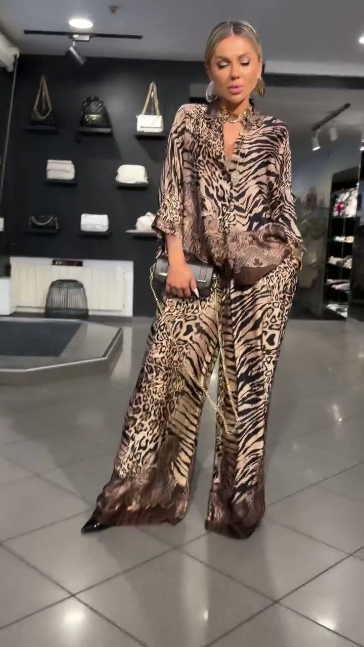 TEVEROLA - Abito lungo rosa plissettato con volant Asymmetric